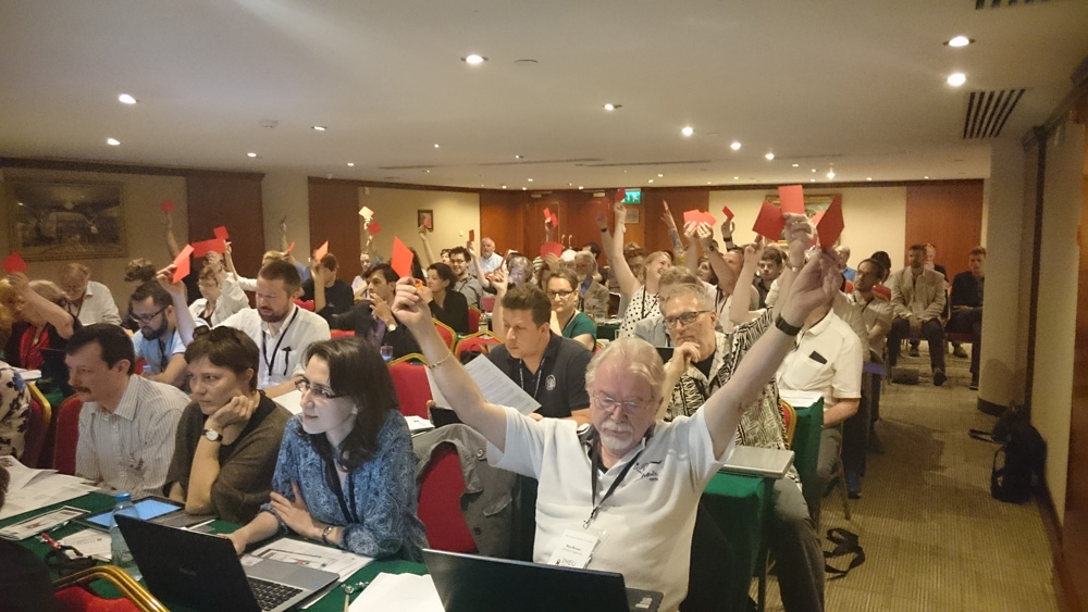 Voting delegates at the IHEU General Assembly 2016 approving new Member Organizations from countries including Iran and Pakistan.